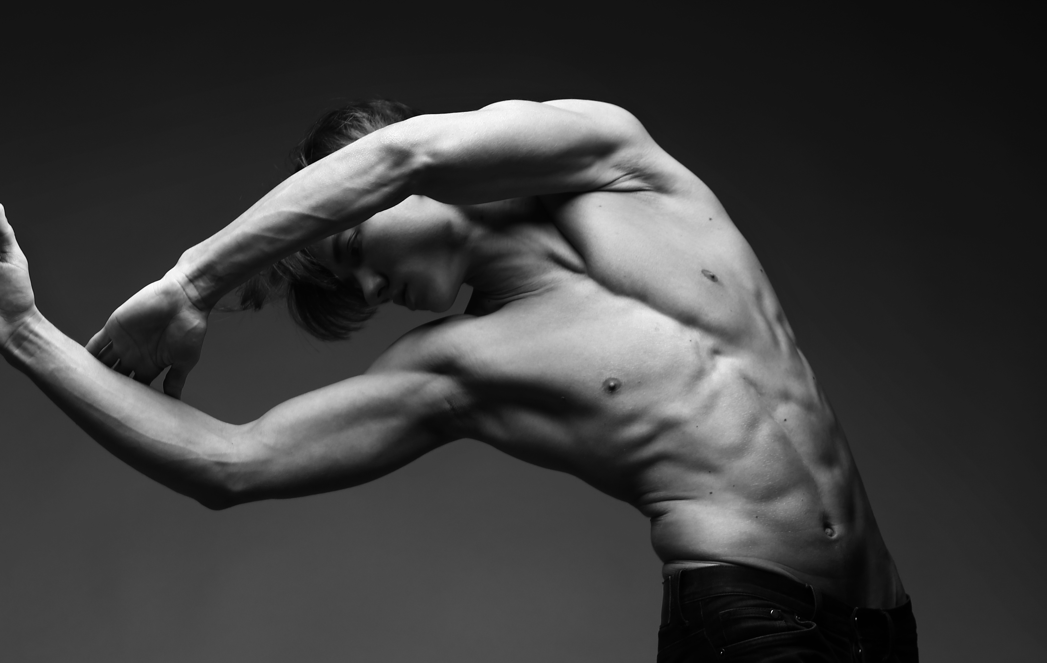 Sculpted athletic torso in black and white